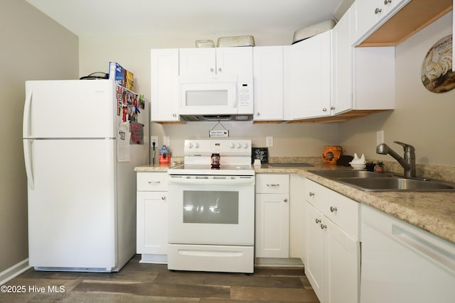 304 Sheffield Rd, Jacksonville, NC 28546 - kitchen featuring white appliances, white cabinetry, and a sink