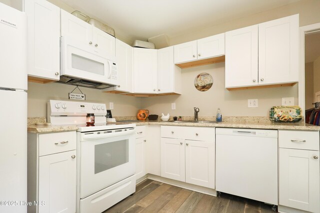 304 Sheffield Rd, Jacksonville, NC 28546 - kitchen with a sink, white cabinetry, light stone countertops, wood finished floors, and white appliances
