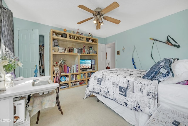 7001 Robert Ruark Dr SE, Southport, NC 28461 - bedroom featuring carpet floors and ceiling fan