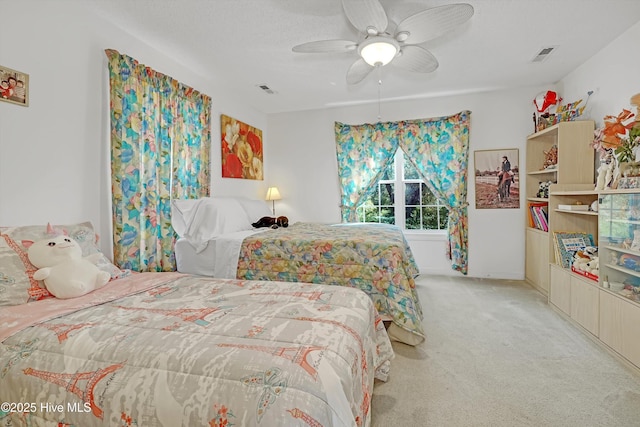 7001 Robert Ruark Dr SE, Southport, NC 28461 - bedroom featuring carpet and ceiling fan