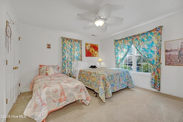 7001 Robert Ruark Dr SE, Southport, NC 28461 - carpeted bedroom with baseboards and ceiling fan