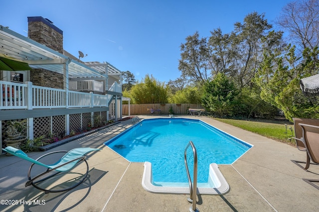 7001 Robert Ruark Dr SE, Southport, NC 28461 - view of swimming pool featuring a patio area and a fenced backyard