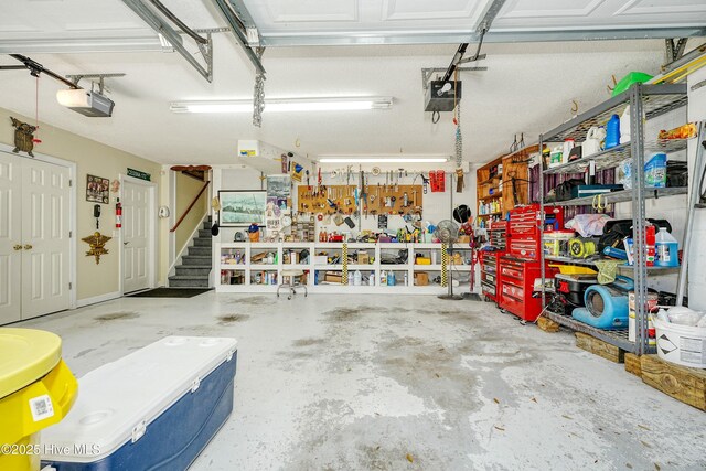 7001 Robert Ruark Dr SE, Southport, NC 28461 - garage with a garage door opener