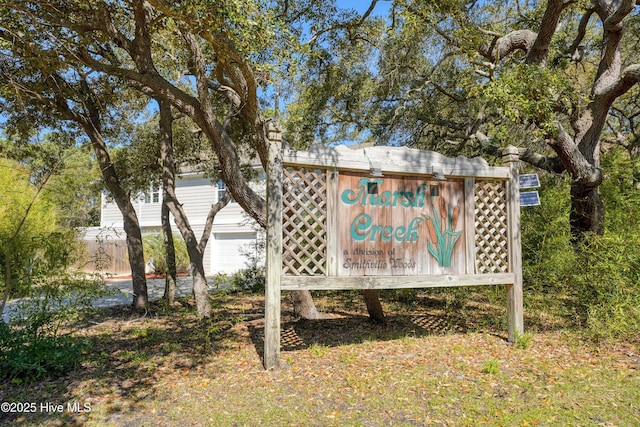 7001 Robert Ruark Dr SE, Southport, NC 28461 - community / neighborhood sign with a garage
