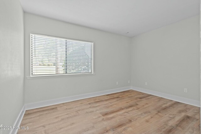 280 Sugar Gum Ln # 165, Pinehurst, NC 28374 - empty room featuring light wood finished floors and baseboards