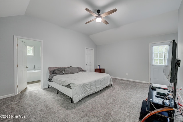 bedroom featuring carpet flooring, baseboards, and lofted ceiling