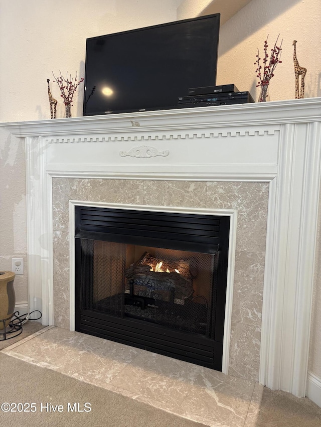 room details with a tiled fireplace