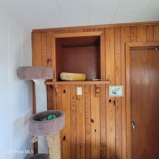 details featuring wood walls