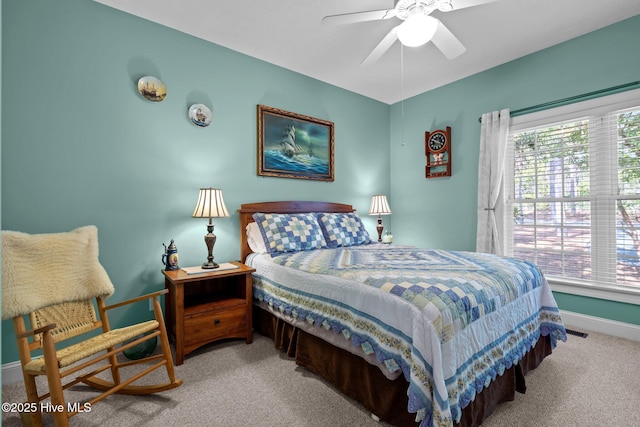 174 Banbridge Dr, West End, NC 27376 - bedroom with baseboards, carpet flooring, visible vents, and multiple windows