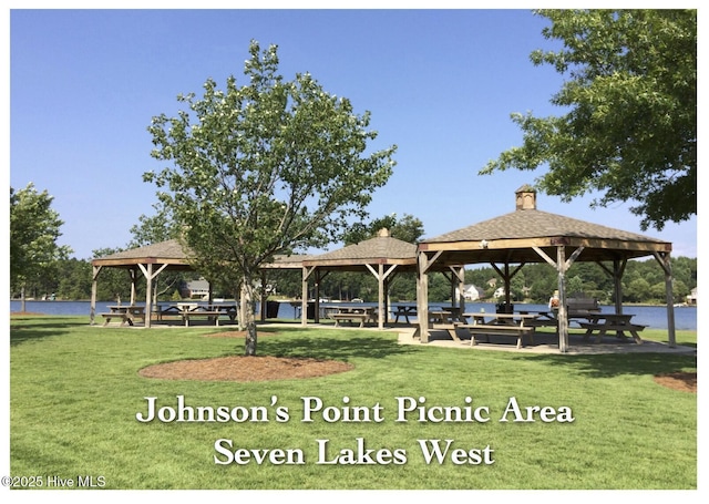surrounding community featuring a gazebo and a yard