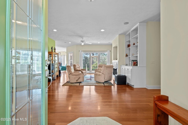 174 Banbridge Dr, West End, NC 27376 - living room with baseboards, recessed lighting, a ceiling fan, and wood finished floors