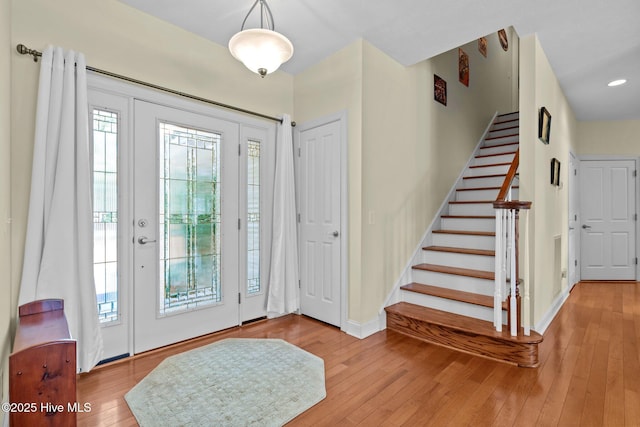 174 Banbridge Dr, West End, NC 27376 - foyer featuring wood-type flooring, baseboards, and stairway