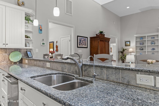 222 Brite Ln, Oriental, NC 28571 - kitchen with visible vents, dark stone countertops, a sink, and open shelves