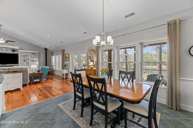 222 Brite Ln, Oriental, NC 28571 - dining area featuring a healthy amount of sunlight, visible vents, lofted ceiling, and wainscoting