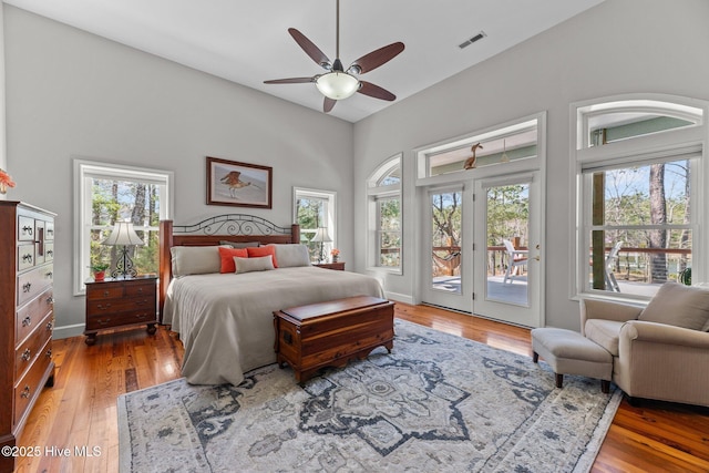 222 Brite Ln, Oriental, NC 28571 - bedroom featuring multiple windows, light wood-style floors, access to exterior, and visible vents