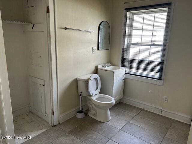 902 Johnston St, Edenton, NC 27932 - bathroom featuring tile patterned floors, vanity, toilet, and baseboards