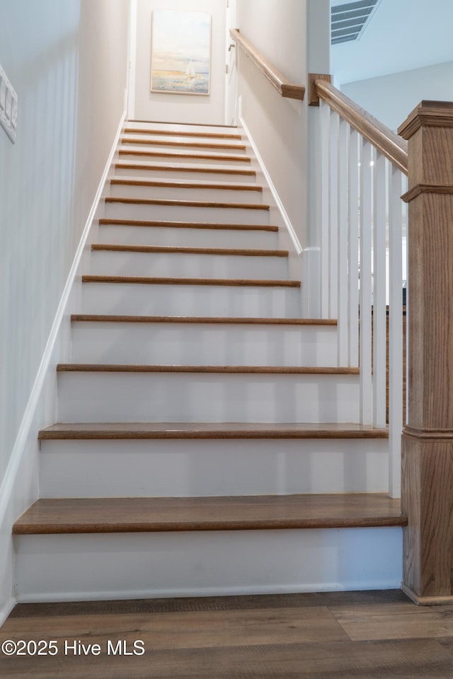 323 Lightning Bug Ln, Holly Ridge, NC 28445 - stairway featuring wood finished floors