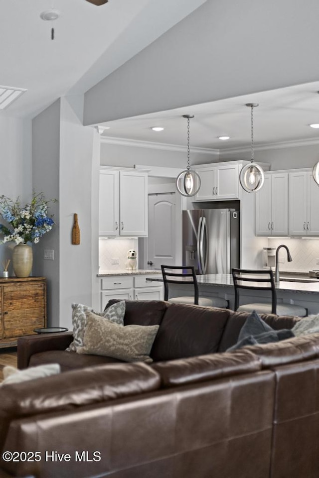 323 Lightning Bug Ln, Holly Ridge, NC 28445 - living area with ornamental molding and recessed lighting