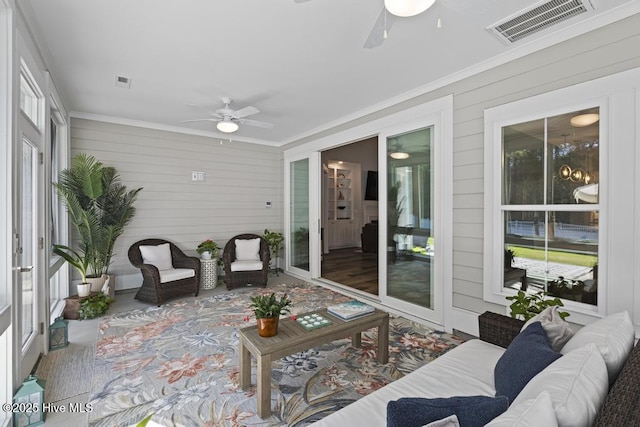 323 Lightning Bug Ln, Holly Ridge, NC 28445 - sunroom / solarium featuring ceiling fan and an outdoor hangout area