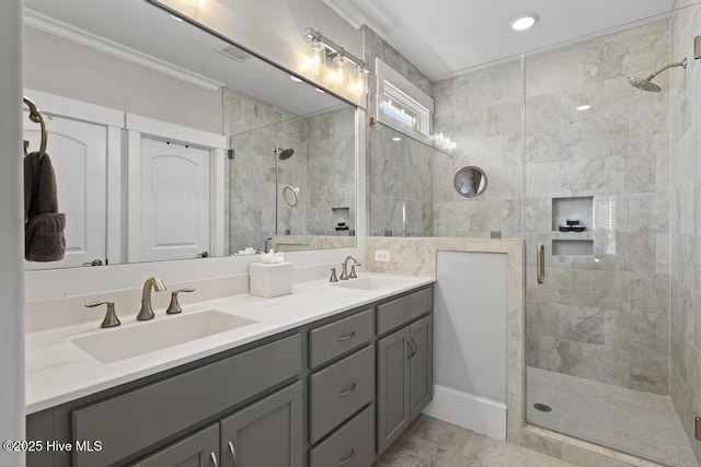 323 Lightning Bug Ln, Holly Ridge, NC 28445 - bathroom with a stall shower, double vanity, crown molding, and marble look tiles