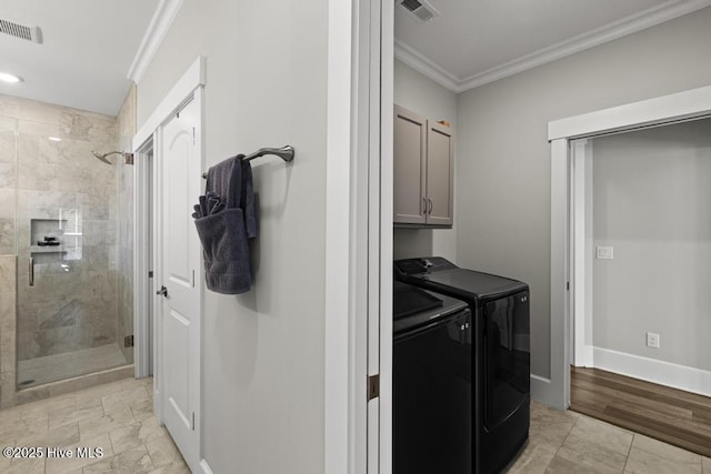 323 Lightning Bug Ln, Holly Ridge, NC 28445 - laundry room featuring washing machine and clothes dryer, crown molding, cabinet space, baseboards, and recessed lighting