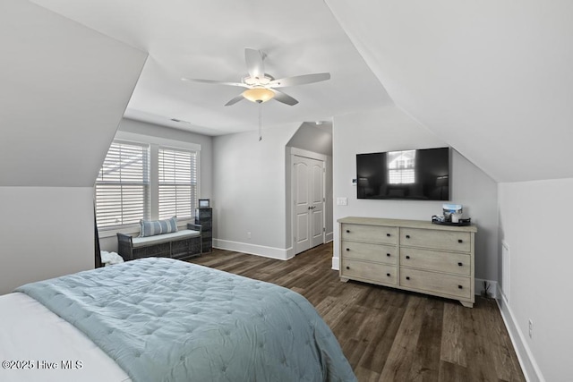 323 Lightning Bug Ln, Holly Ridge, NC 28445 - bedroom with dark wood-type flooring, lofted ceiling, baseboards, and a ceiling fan