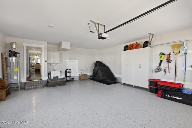 323 Lightning Bug Ln, Holly Ridge, NC 28445 - garage with water heater and a garage door opener