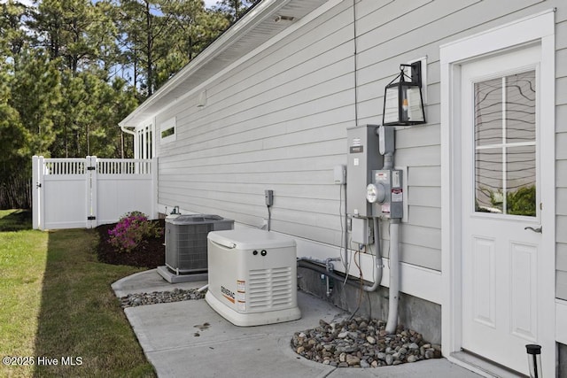 323 Lightning Bug Ln, Holly Ridge, NC 28445 - view of side of home featuring central AC unit