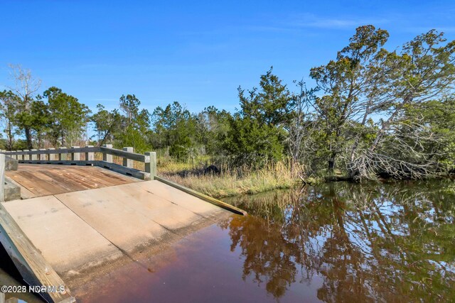 323 Lightning Bug Ln, Holly Ridge, NC 28445 - dock area with a water view