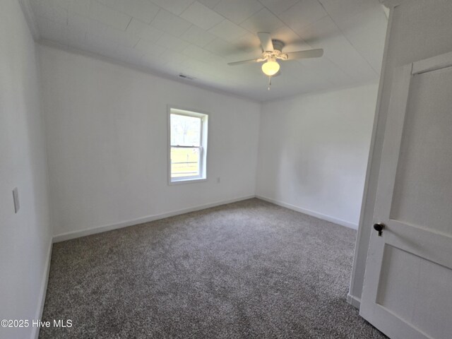 117 Flowers St, Rockingham, NC 28379 - empty room featuring baseboards, a ceiling fan, visible vents, and carpet