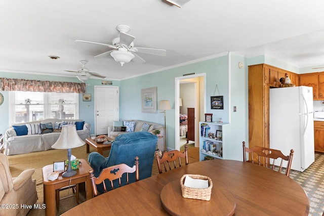 713 Channel Blvd, Topsail Beach, NC 28445 - dining room with a ceiling fan and ornamental molding