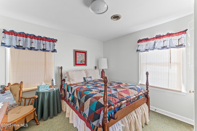 713 Channel Blvd, Topsail Beach, NC 28445 - bedroom featuring carpet flooring, baseboards, and visible vents