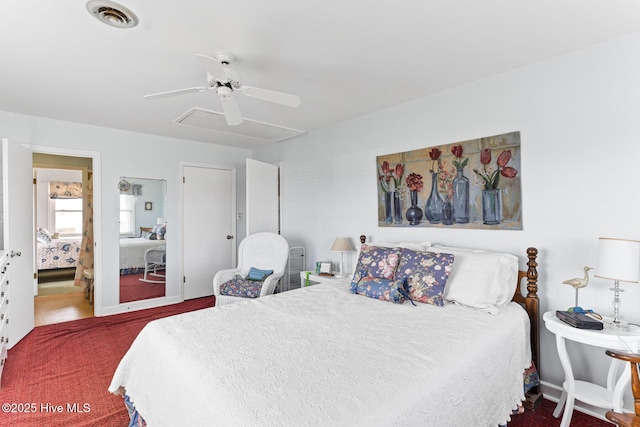 713 Channel Blvd, Topsail Beach, NC 28445 - bedroom featuring carpet floors, a ceiling fan, visible vents, and attic access