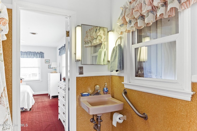 713 Channel Blvd, Topsail Beach, NC 28445 - ensuite bathroom featuring a sink and ensuite bath