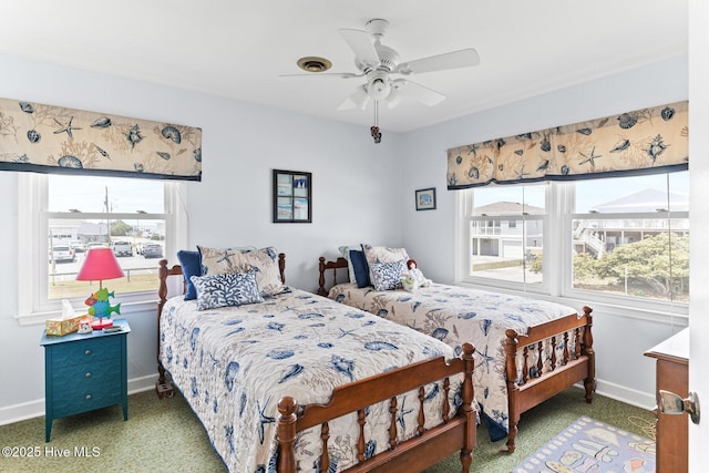 713 Channel Blvd, Topsail Beach, NC 28445 - bedroom featuring carpet flooring, a ceiling fan, and baseboards