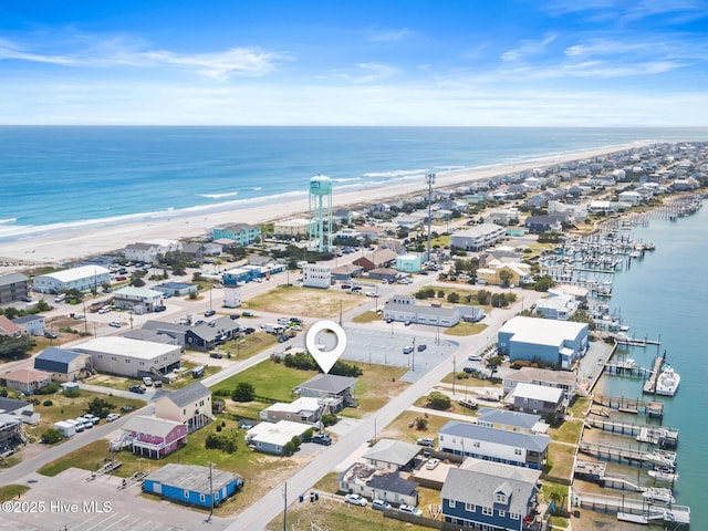713 Channel Blvd, Topsail Beach, NC 28445 - drone / aerial view with a beach view and a water view