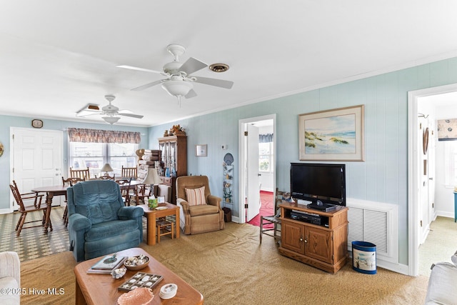 713 Channel Blvd, Topsail Beach, NC 28445 - living area featuring ornamental molding, a healthy amount of sunlight, and light carpet