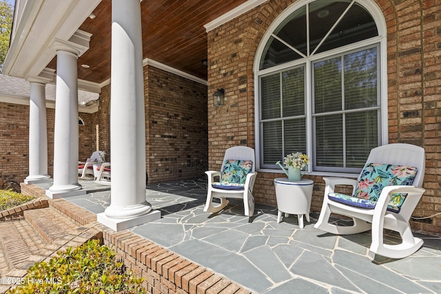 view of patio featuring a porch