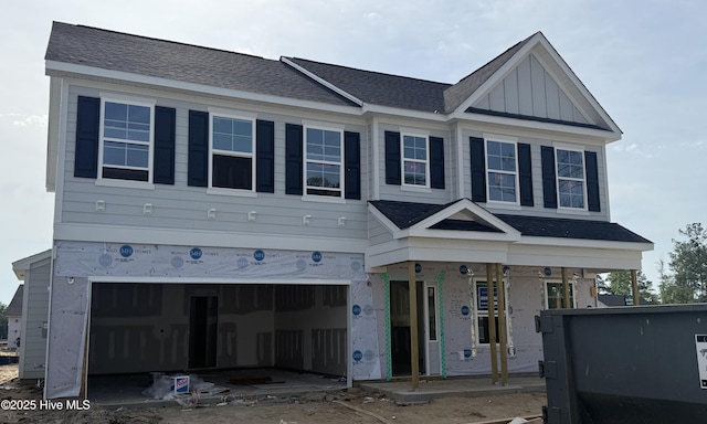1008 Peace St Lot 69, Leland, NC 28451 - view of front of house featuring an attached garage, board and batten siding, and a shingled roof