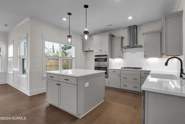 1008 Peace St Lot 69, Leland, NC 28451 - kitchen with wall chimney exhaust hood, a sink, double oven, backsplash, and dark wood finished floors