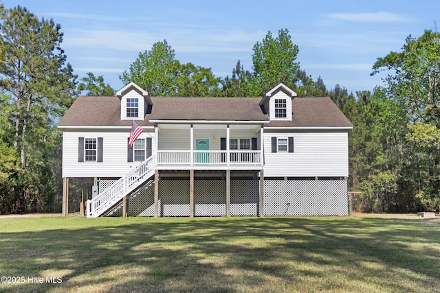 318 Winchester Way, Merritt, NC 28556 - rear view of property with a porch, a yard, stairs, and a shingled roof