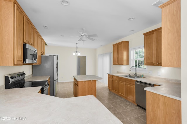 318 Winchester Way, Merritt, NC 28556 - kitchen featuring stainless steel appliances, light countertops, visible vents, a ceiling fan, and a sink