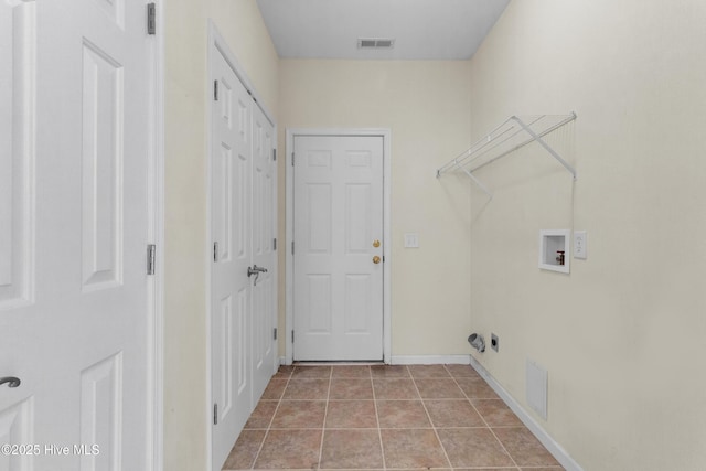 318 Winchester Way, Merritt, NC 28556 - clothes washing area featuring laundry area, visible vents, light tile patterned flooring, hookup for a washing machine, and baseboards