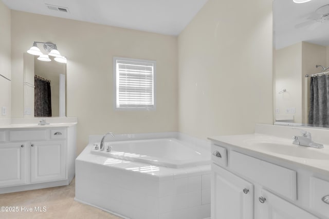 318 Winchester Way, Merritt, NC 28556 - full bath featuring a bath, visible vents, tile patterned floors, and a sink