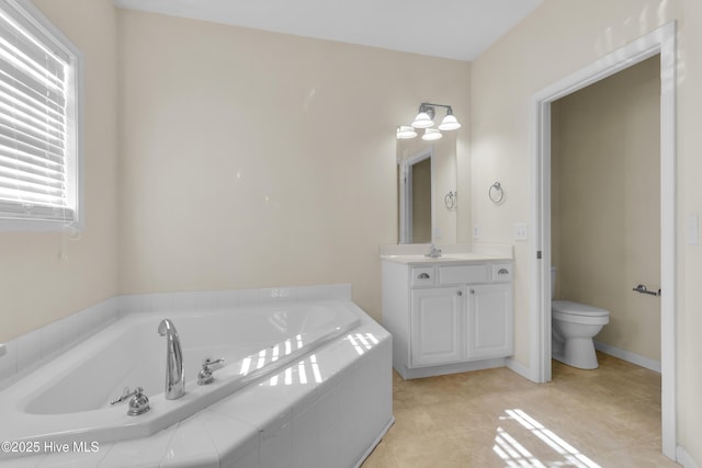 318 Winchester Way, Merritt, NC 28556 - full bathroom with a bath, vanity, and toilet