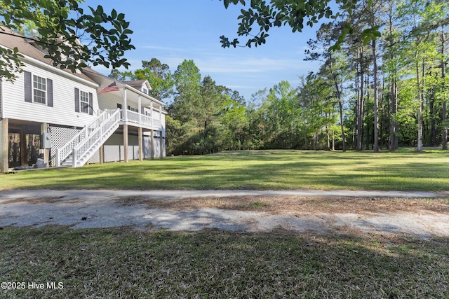 318 Winchester Way, Merritt, NC 28556 - view of yard featuring stairs