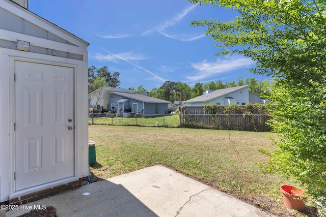 view of yard with a patio area and fence