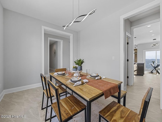 371 Narrow Shore Rd, Aydlett, NC 27916 - dining space with baseboards and recessed lighting