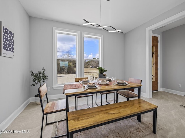 371 Narrow Shore Rd, Aydlett, NC 27916 - dining area featuring plenty of natural light and baseboards