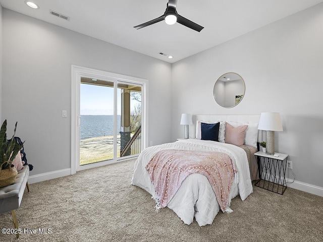 371 Narrow Shore Rd, Aydlett, NC 27916 - bedroom featuring access to outside, carpet, baseboards, recessed lighting, and a water view